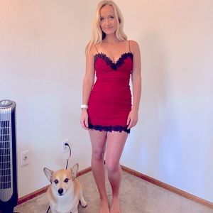 Strapless red clubbing dress.